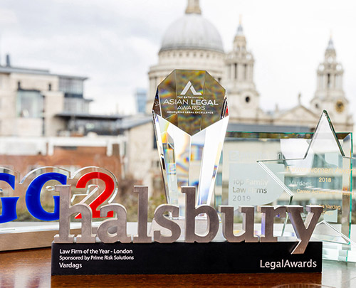 A display of Vardags' award trophies for top divorce solicitor, by a window overlooking St Paul&