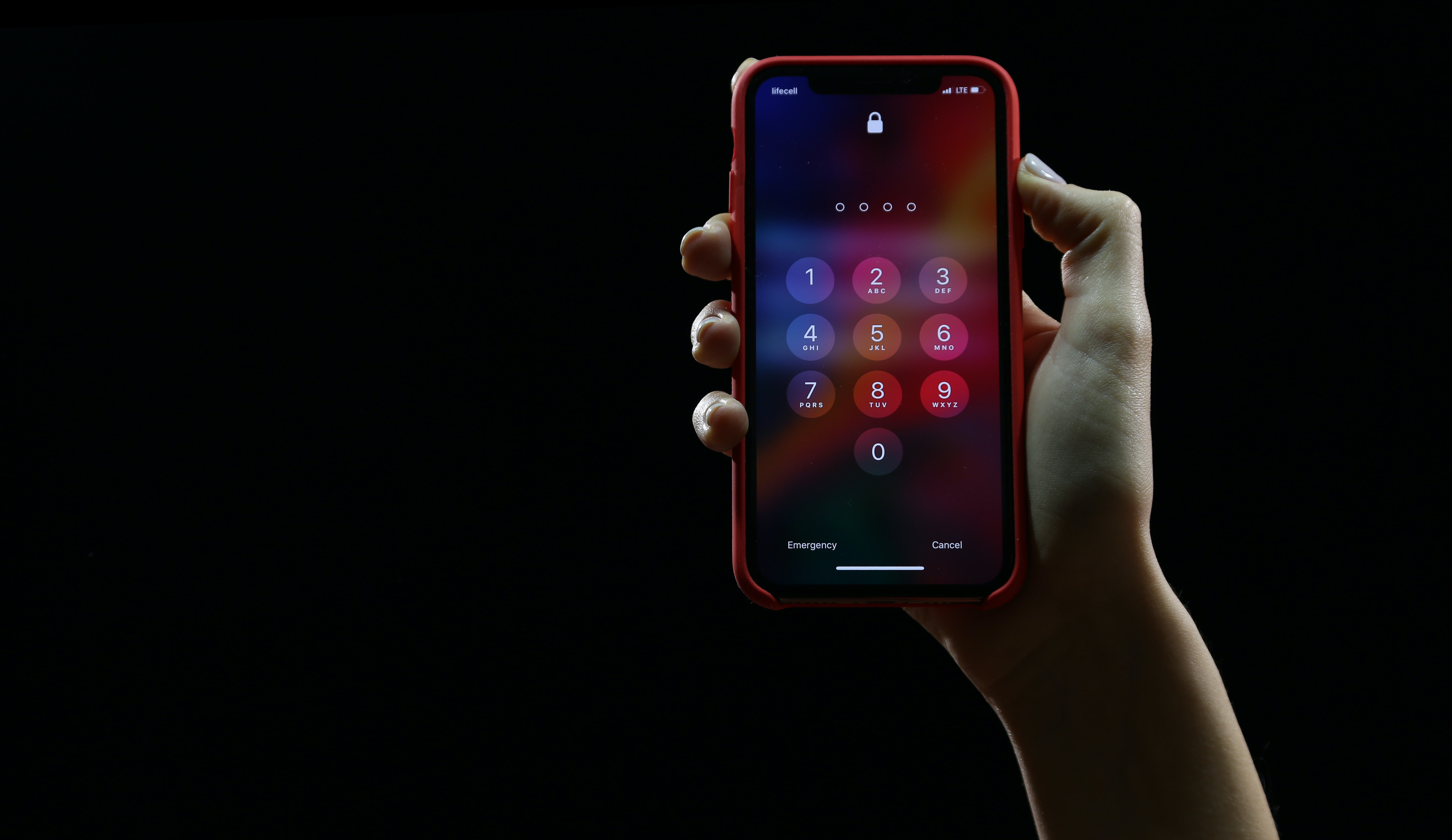 iPhone being held in hand